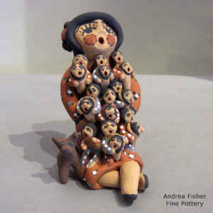 17 children and a dog on a grandmother storyteller