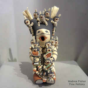 14 children on a grandmother koshare storyteller