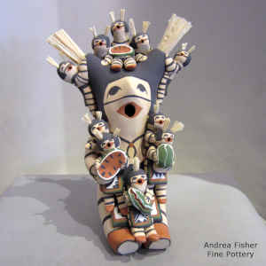 Ten children on a koshare storyteller
