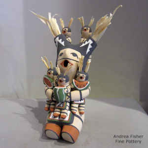 Five children on a koshare storyteller
