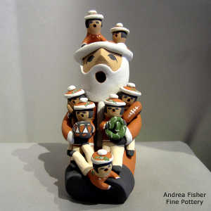 7 children on a Santa Claus storyteller