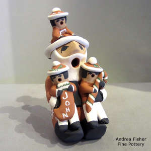 3 children on a Santa Claus storyteller