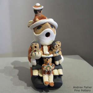 5 children on a Santa Claus storyteller