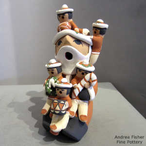 5 children on a Santa Claus storyteller