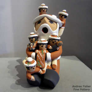 6 children on a Santa Claus storyteller