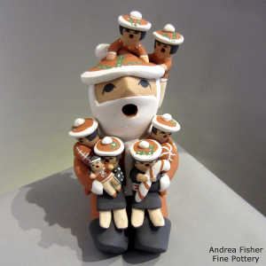 7 children on a Santa Claus storyteller