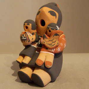 Two children on a grandmother storyteller