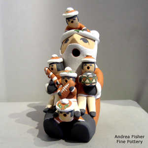 5 children on a Santa Claus storyteller