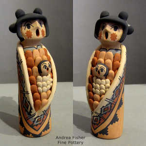 One child on a Corn Maiden figure