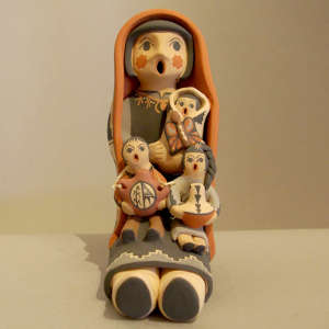 Three children on a grandmother storyteller