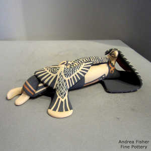 One chick on a lounging eagle storyteller