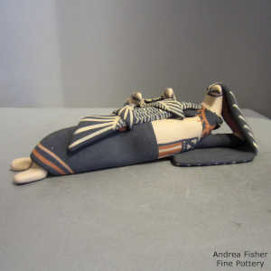 Two chicks on a lounging eagle storyteller