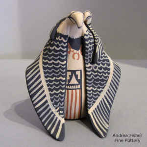 1 chick on a kneeling eagle storyteller