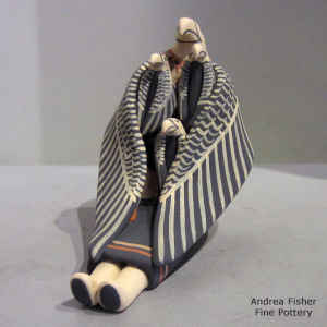 3 chicks on a sitting eagle storyteller