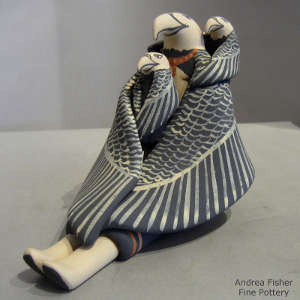 Two children on an eagle storyteller