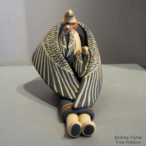 Two children on an eagle storyteller