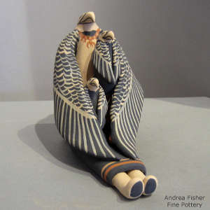 Two children on an eagle storyteller