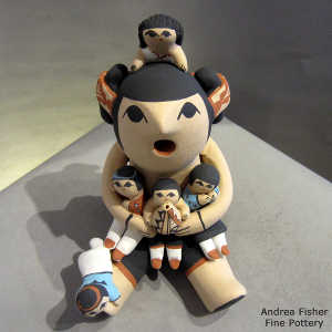 5 children on a grandmother storyteller