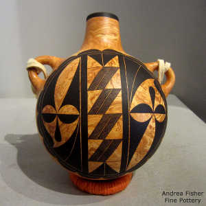Black geometric design on a Mixed clay canteen