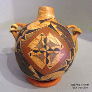 Geometric design on a mixed-clay polychrome canteen