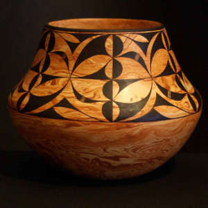 Geometric designs on a Mixed clay jar