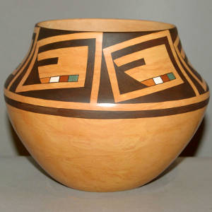 Polychrome katsina face design on a Mixed clay jar