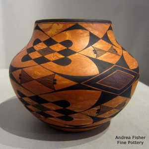 Mixed clay jar with a black geometric design
