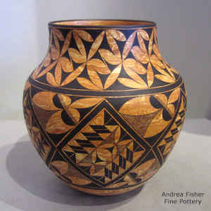 Geometric design on a marbleized clay jar