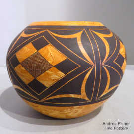 4-panel black geometric design on a marbleized clay jar