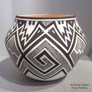 Lightning bolt, Tularosa spiral, fine line and geometric design on a black and white jar