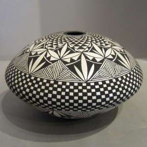 Geometric design on a black and white seed pot
