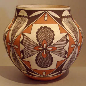 Fine line, medallion and geometric design on a polychrome jar