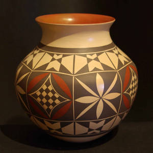 Laguna shard designs decorate a polychrome Hopi clay jar