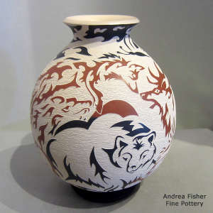 Sgraffito willdlife design on a polychrome jar