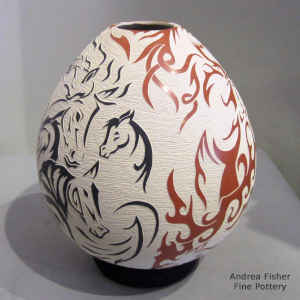 Black, red and white jar with sgraffito horse and geometric design