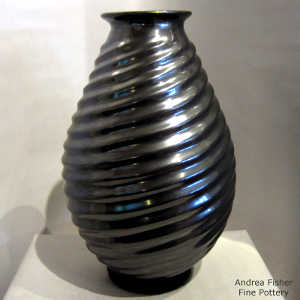 Spiral ribs on a black graphite jar