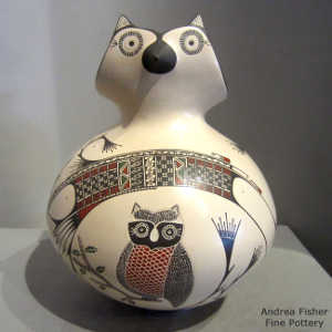 Owl and branch design on an owl jar decorated with a Paquime geometric design