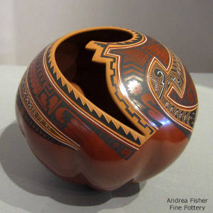 Paquime geometric designs decorate a polychrome melon jar with an organic opening