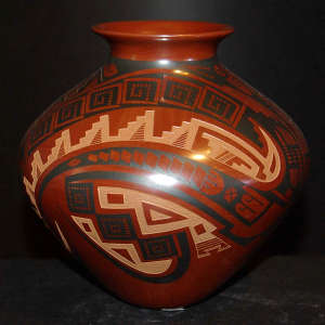 Sgraffito and painted geometric designs on a polychrome redware jar