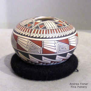 Geometric design on a polychrome seed pot