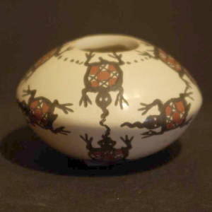 Lizard and geometric design on a polychrome seedpot