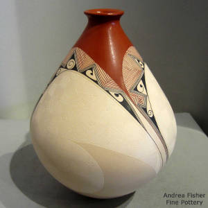 Sgraffito and geometric design on a thin-neck jar