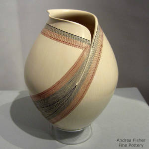 Geometric design on a polychrome jar with an organic opening