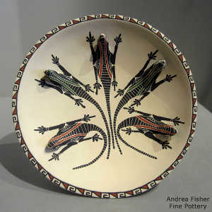 Sgraffito, painted and formed lizard design on a self-standing polychrome plate