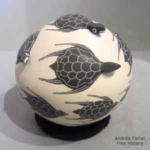 Applique, sgraffito and painted turtle design on a polychrome seed pot