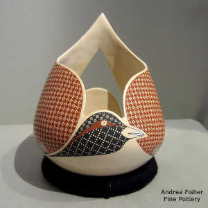 Click to see a larger version Geometric design on a polychrome stylized bird effigy