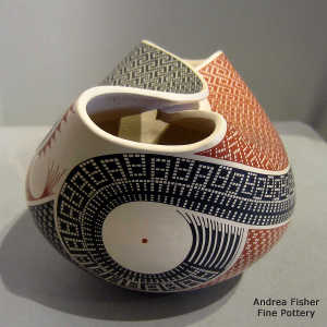 Geometric design on a folded polychrome bowl