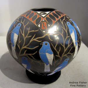 Sgraffito and painted bluebird, vine and geometric design on a polychrome jar