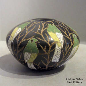Sgraffito and painted bird and branch motif on a polychrome jar