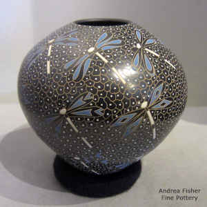Polychrome jar with sgraffito and painted dragonfly and mesh design